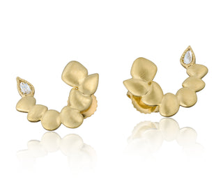 Front view of 18kt yellow gold Seaside earrings featuring a unique half-sphere shape built out of our pebbled gold Seaside design by John Apel.