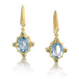 Front view of 18kt yellow gold Seaside earrings with aqua gemstones and green demantoid by John Apel.