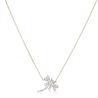 Necklace with a delicate platinum dragonfly pendant on a white background.