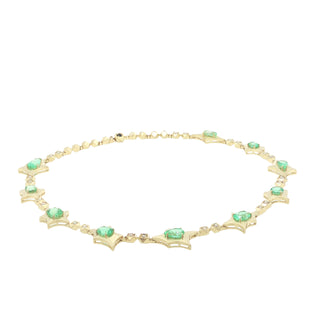 John Apel Interstellar emerald and diamond necklace in 18kt yellow gold, laid flat