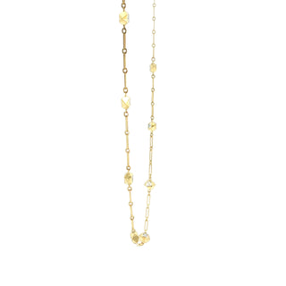 John Apel Interstellar sapphire and diamond necklace in yellow gold, angled view