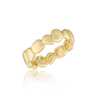 Gold ring with textured design on a white background