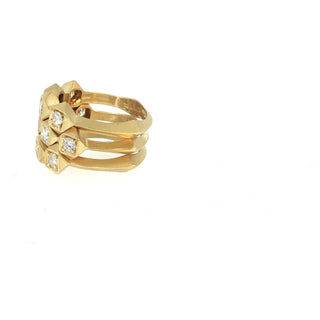 Full three-ring Interstellar diamond stack in 18kt yellow gold by John Apel, side view