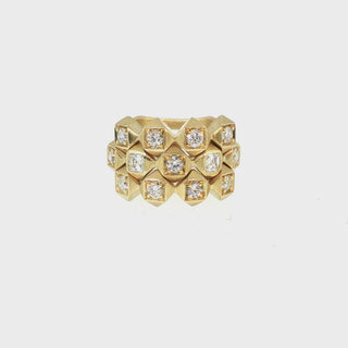 Video of three John Apel Interstellar geometric diamond rings worn as a full stack in 18kt yellow gold