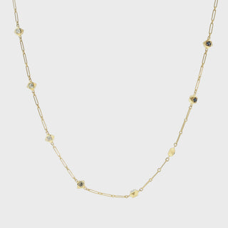 Video of the John Apel Interstellar chain necklace showing faceted Asscher-cut diamond and sapphire sections