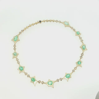 Video of the John Apel Interstellar Colombian emerald and diamond necklace in 18kt yellow gold